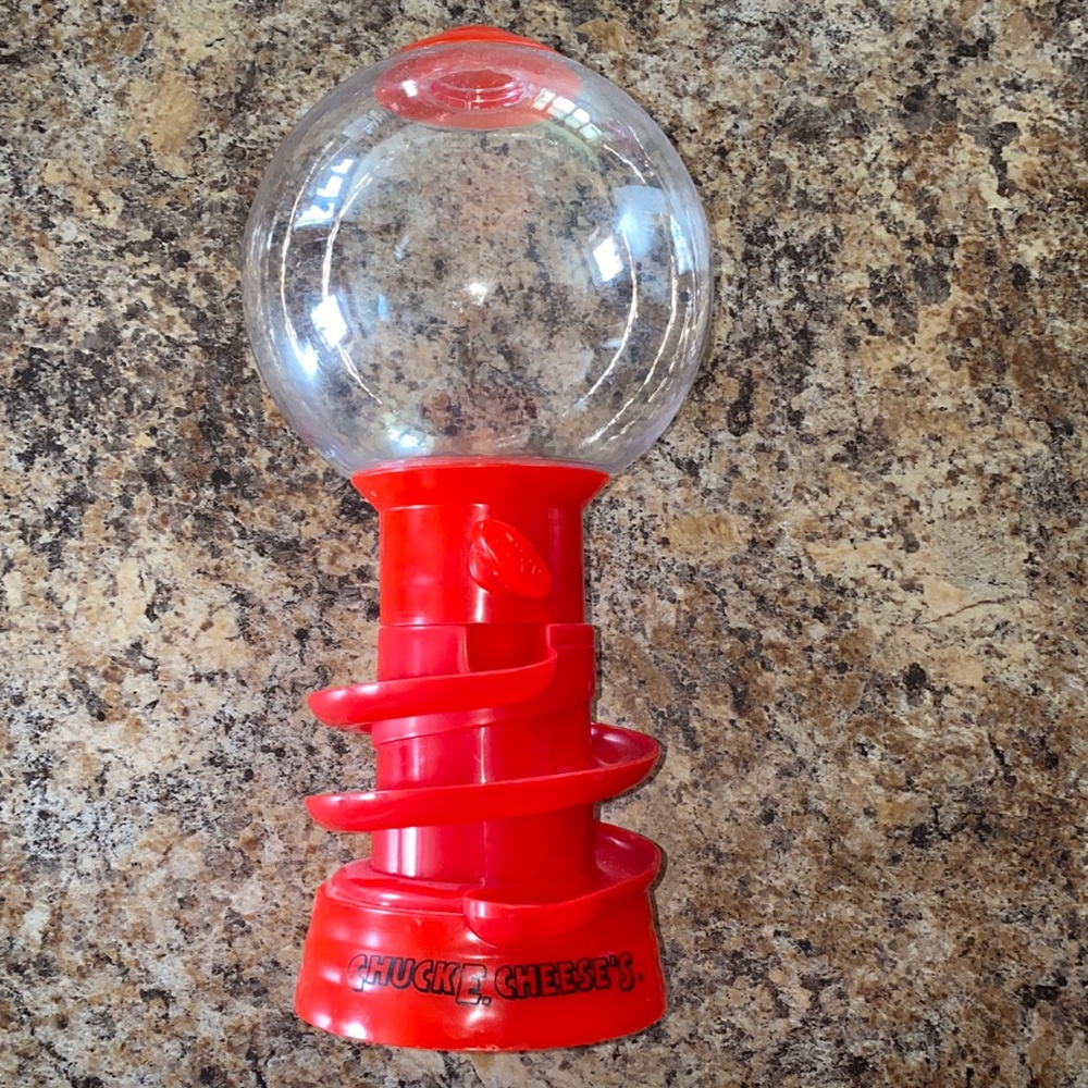Chuck E Cheese’s small gum ball dispenser Red